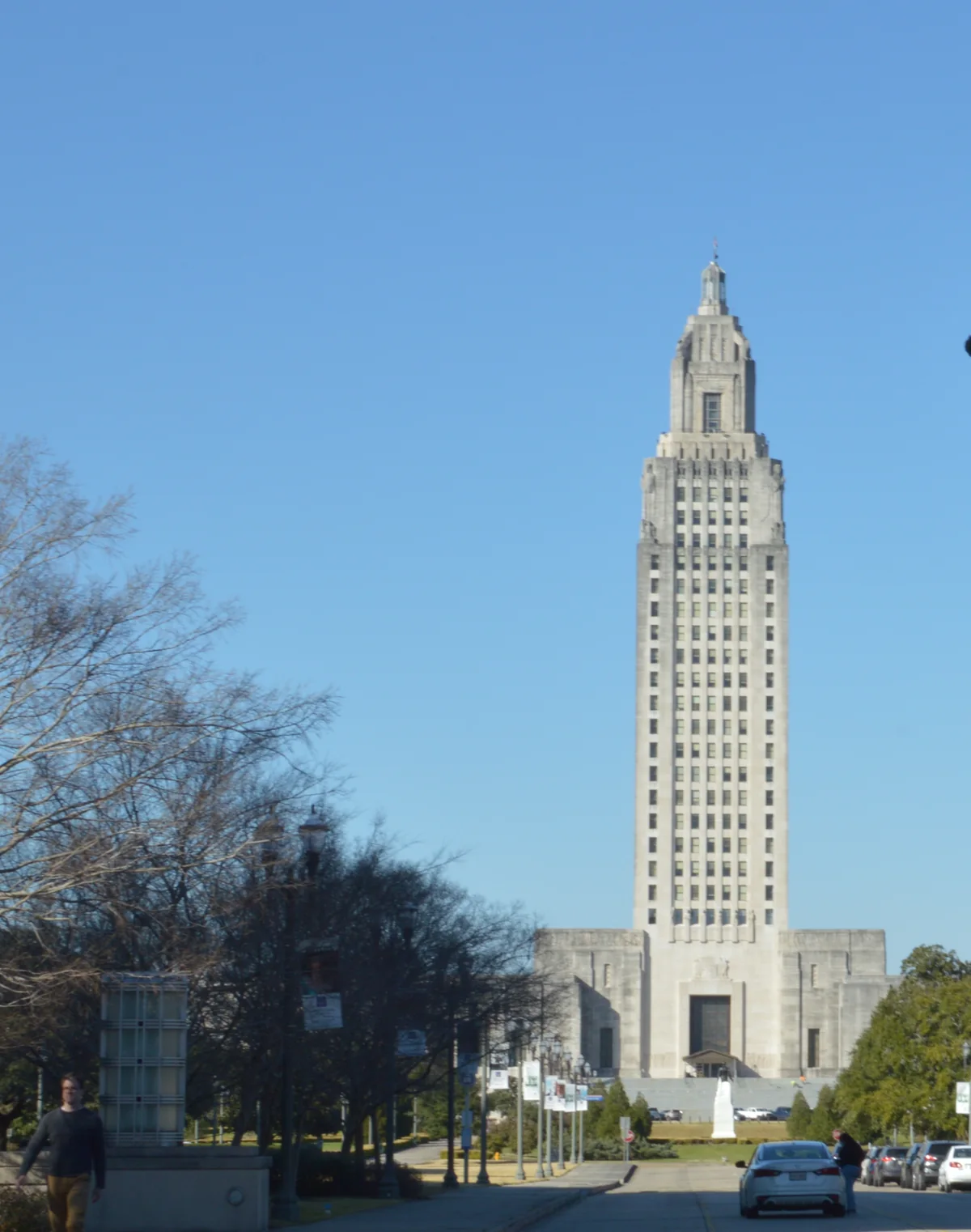 The Louisiana State Capitol tower in downtown Baton Rouge under a clear blue sky
